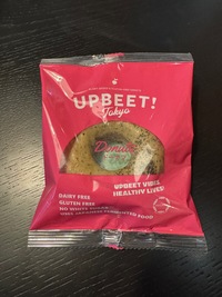 pink package with green spronkeled donut, label says dairy free, gluten free, white sugar free