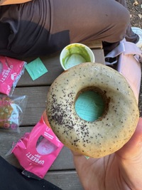 top view light brown donut with sprinkles